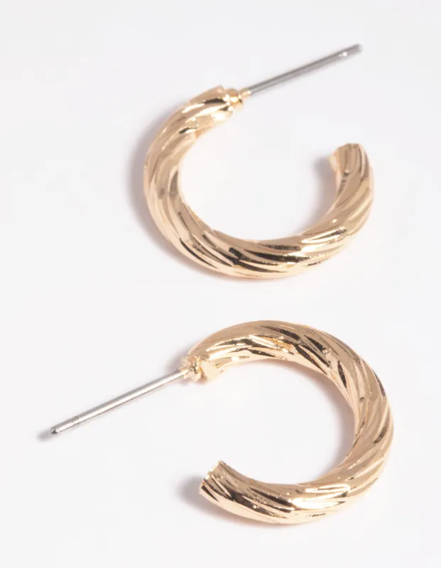 Gold Twisted Huggie Hoop Earrings sold by lovisa