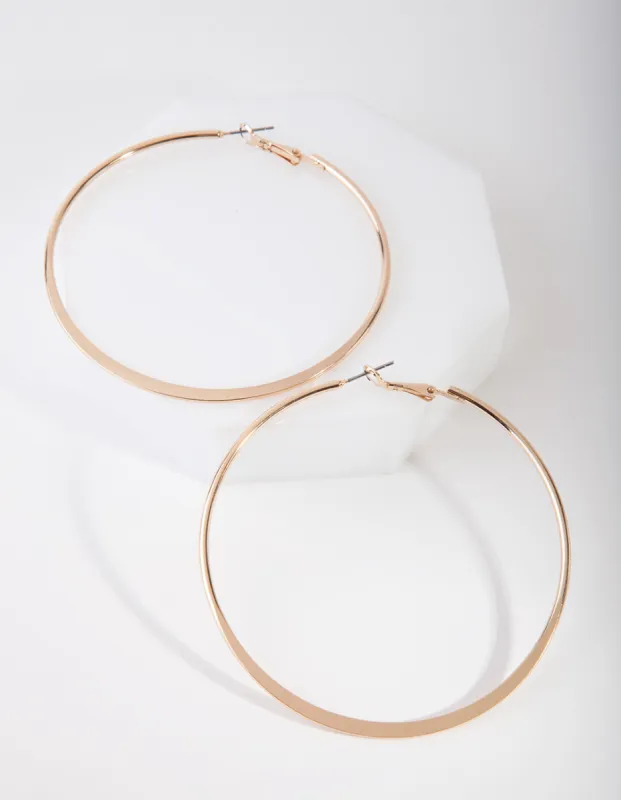 Gold Flat Edge Hoop Earrings sold by lovisa