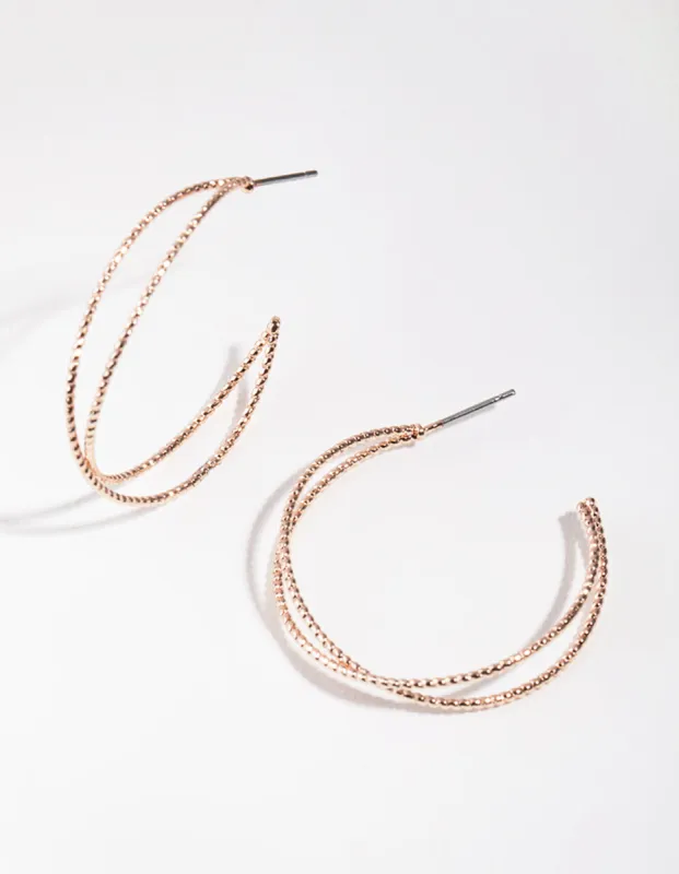 Rose Gold Crossover Hoop Earrings sold by lovisa