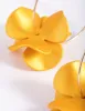 Matte Yellow Flower Hoop Earrings sold by lovisa
