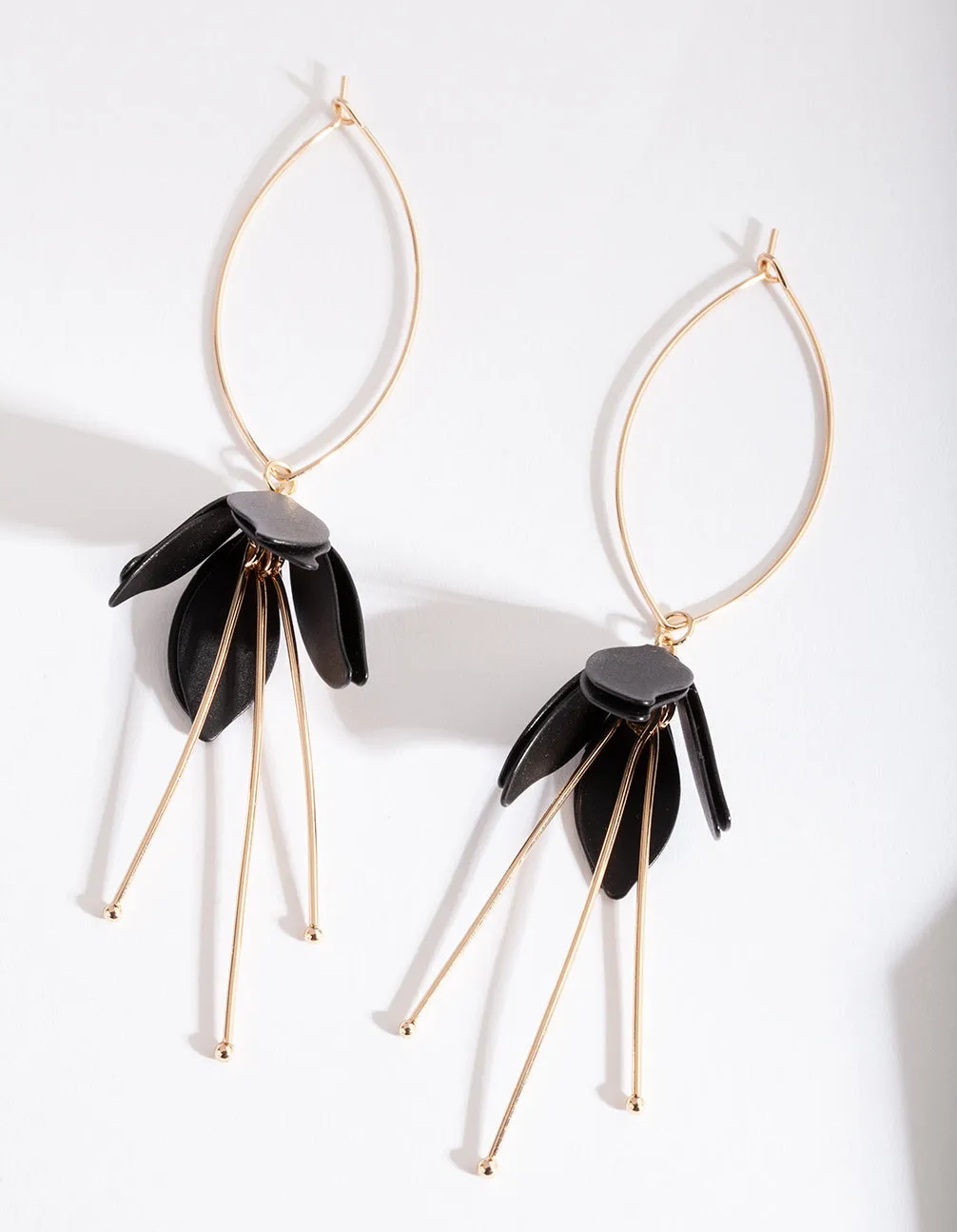 Black Gold Flower Drop Earrings sold by lovisa
