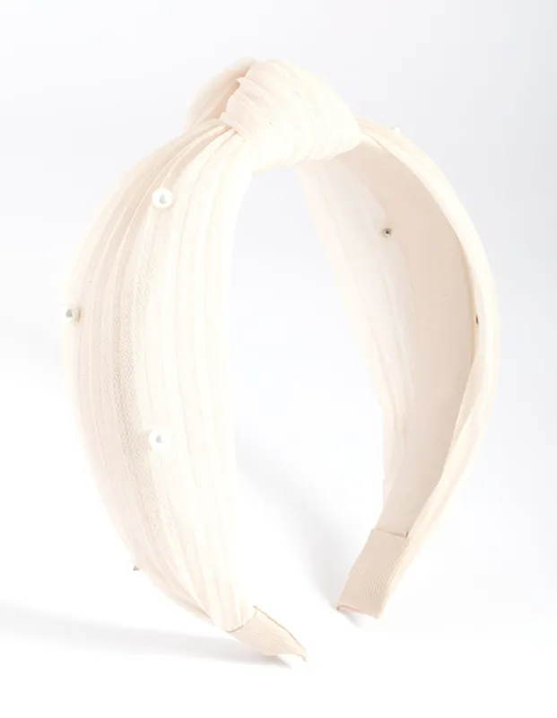Cream Pearl Knot Headband sold by lovisa