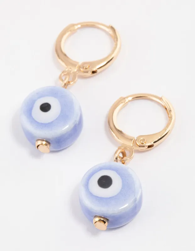 Gold Mini Evil Eye Huggie Earrings sold by lovisa