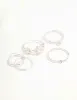 Silver Twisted, Sleek & Diamante Flower Style Rings 6-Pack sold by lovisa