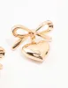 Gold Bow & Puffy Heart Drop Earrings sold by lovisa