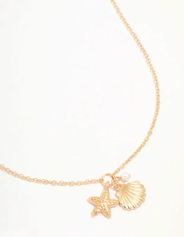 Gold Clam Shell & Starfish Necklace sold by lovisa