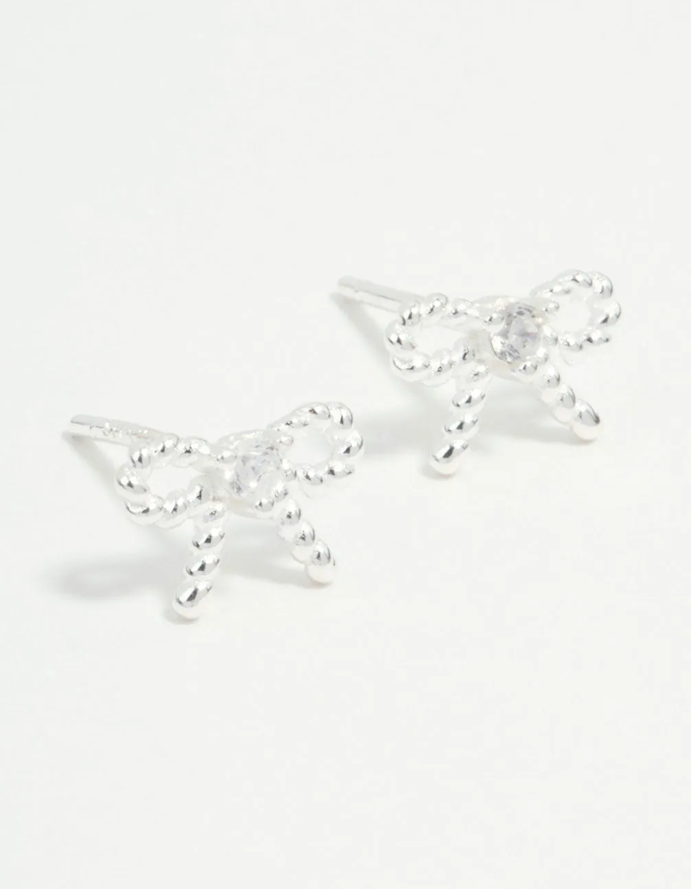 Sterling Silver Textured Bow Stud Earrings sold by lovisa