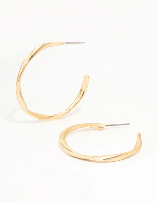 Gold Wrapped Thin Hoop Earrings sold by lovisa