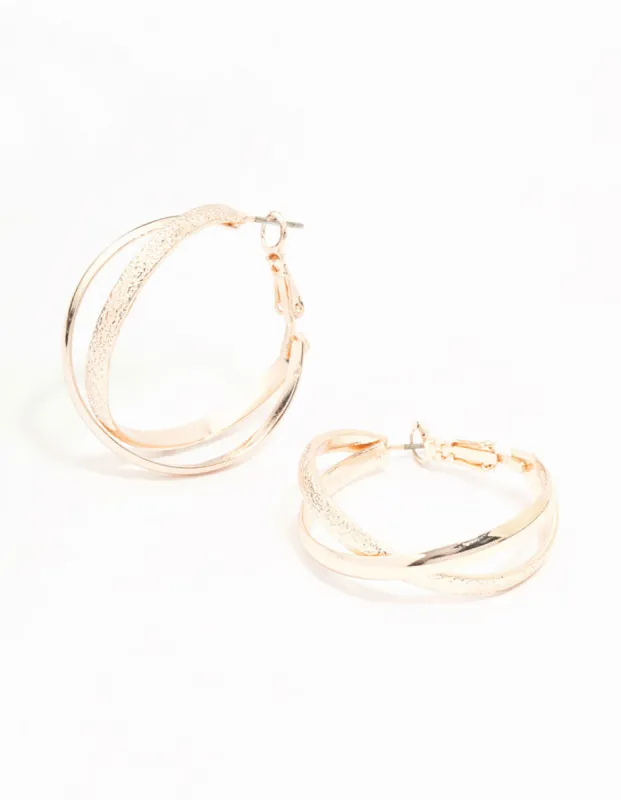 Rose Gold Mixed Textured Crossover Hoop Earrings sold by lovisa