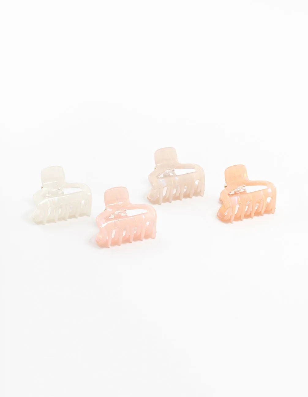Small Pink & White Acrylic Shaped Claw Clips 4-Pack sold by lovisa