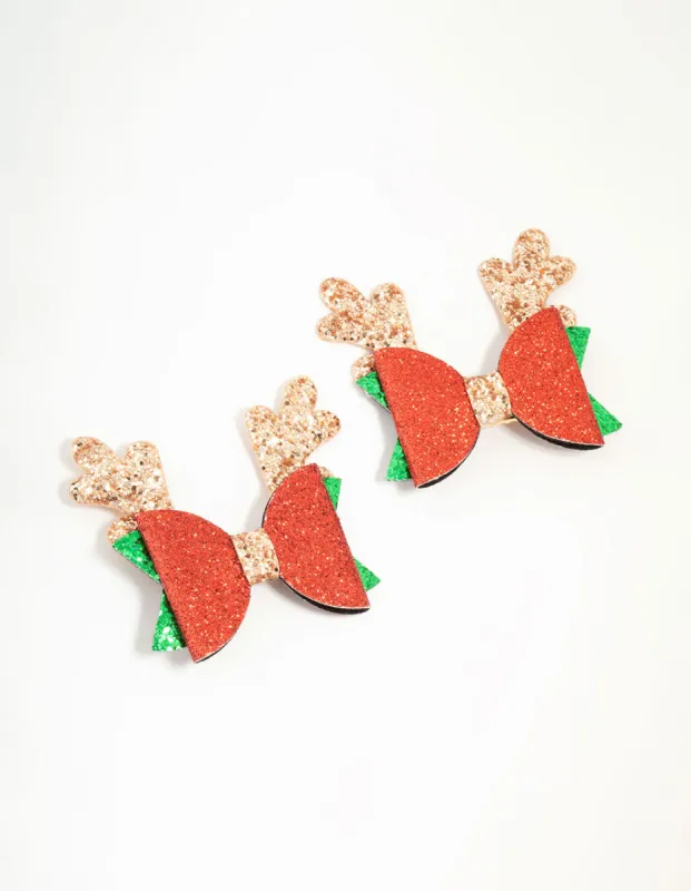 Red Glitter Reindeer Bow Hair Clips 2-Pack sold by lovisa