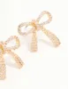 Gold Cubic Zirconia Bow Stud Earrings sold by lovisa