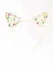 Yellow, Green & Red Bells Gold Headband sold by lovisa