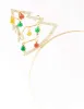 Yellow, Green & Red Bells Gold Headband sold by lovisa