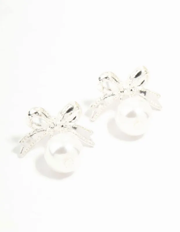 Silver Bow & Pearl Small Drop Earrings sold by lovisa