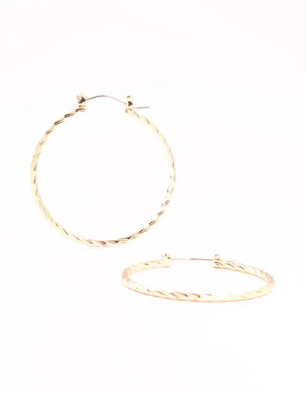 Gold Fine Diamond Cut Hoop Earrings sold by lovisa