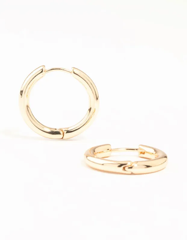 Gold Round Medium Huggie Earrings sold by lovisa