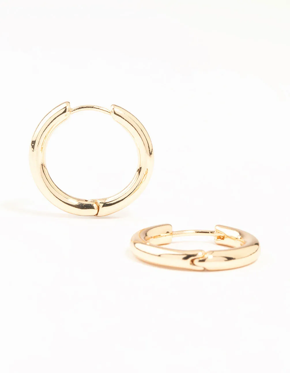 Gold Round Medium Huggie Earrings sold by lovisa