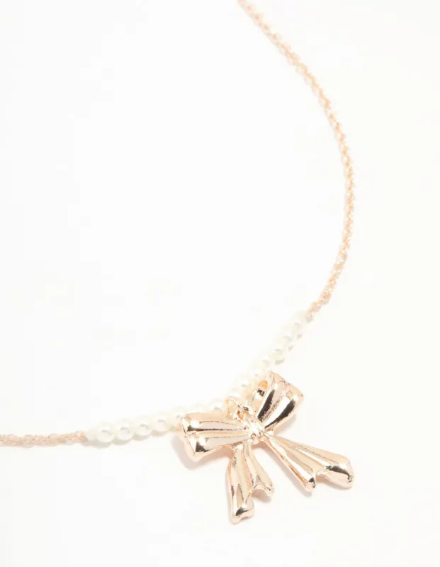 Rose Gold Pearl Bow Necklace sold by lovisa