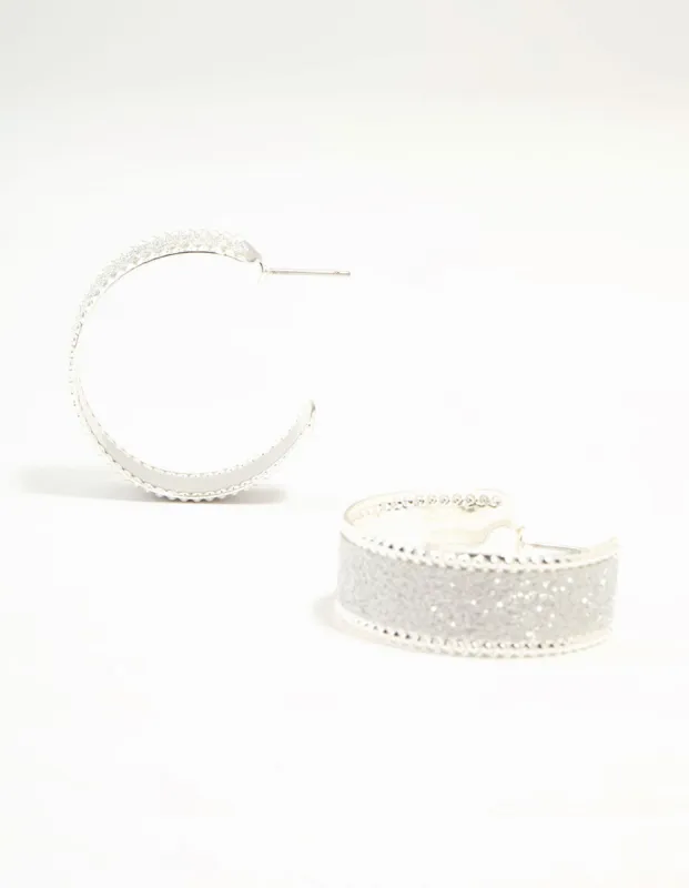 Silver Wide Glitter Hoop Earrings sold by lovisa