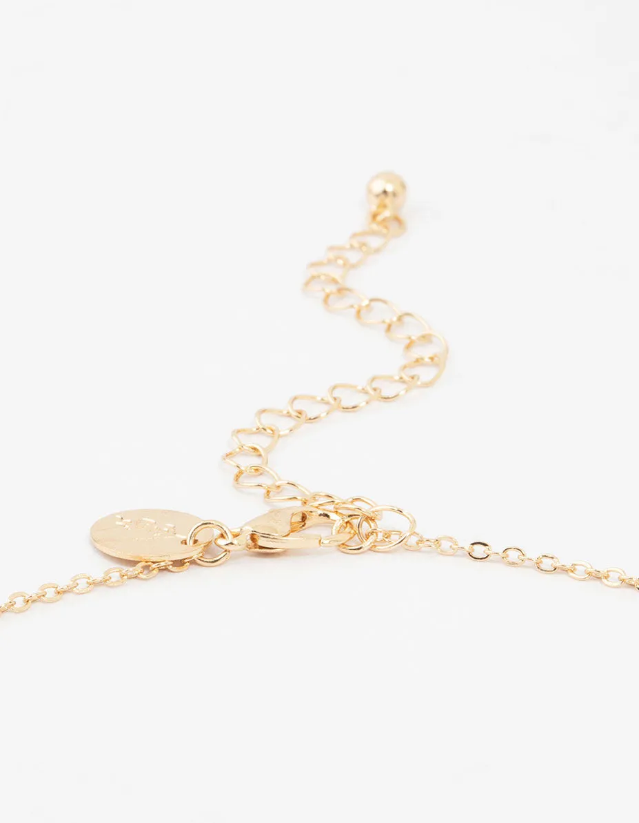 Gold Bubble Cross Necklace and Earrings Set sold by lovisa product image thumbnail 3