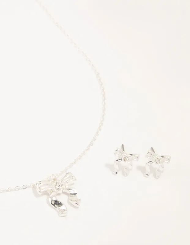 Silver Bow Necklace and Earrings Set sold by lovisa