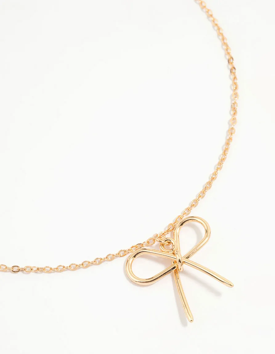 Gold Fine Metal Bow Necklace sold by lovisa