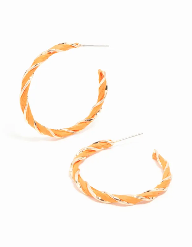Gold Orange Twisted Hoop Earrings sold by lovisa