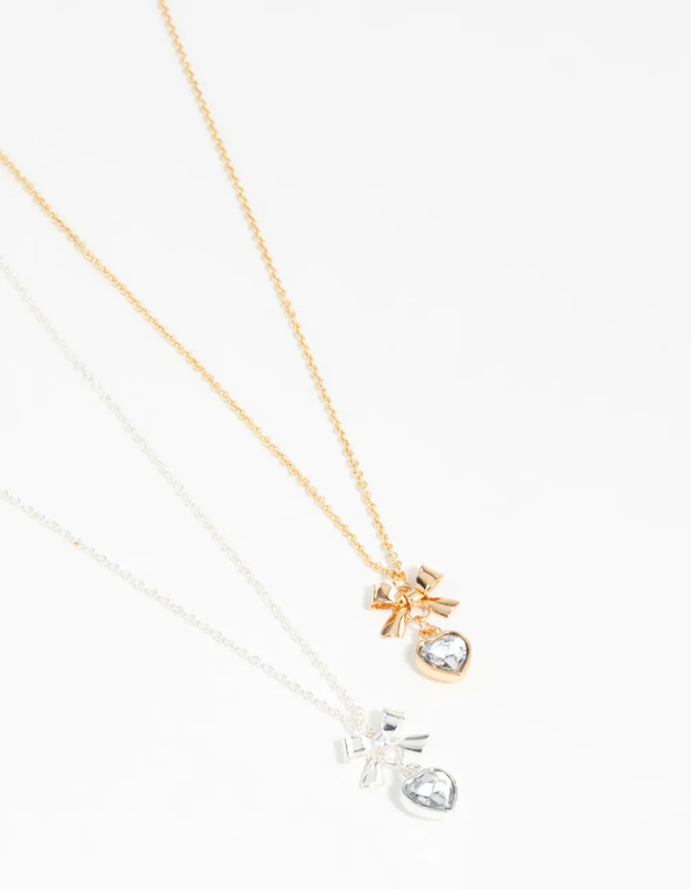 Heart & Bow Pendant Necklaces 2-Pack sold by lovisa