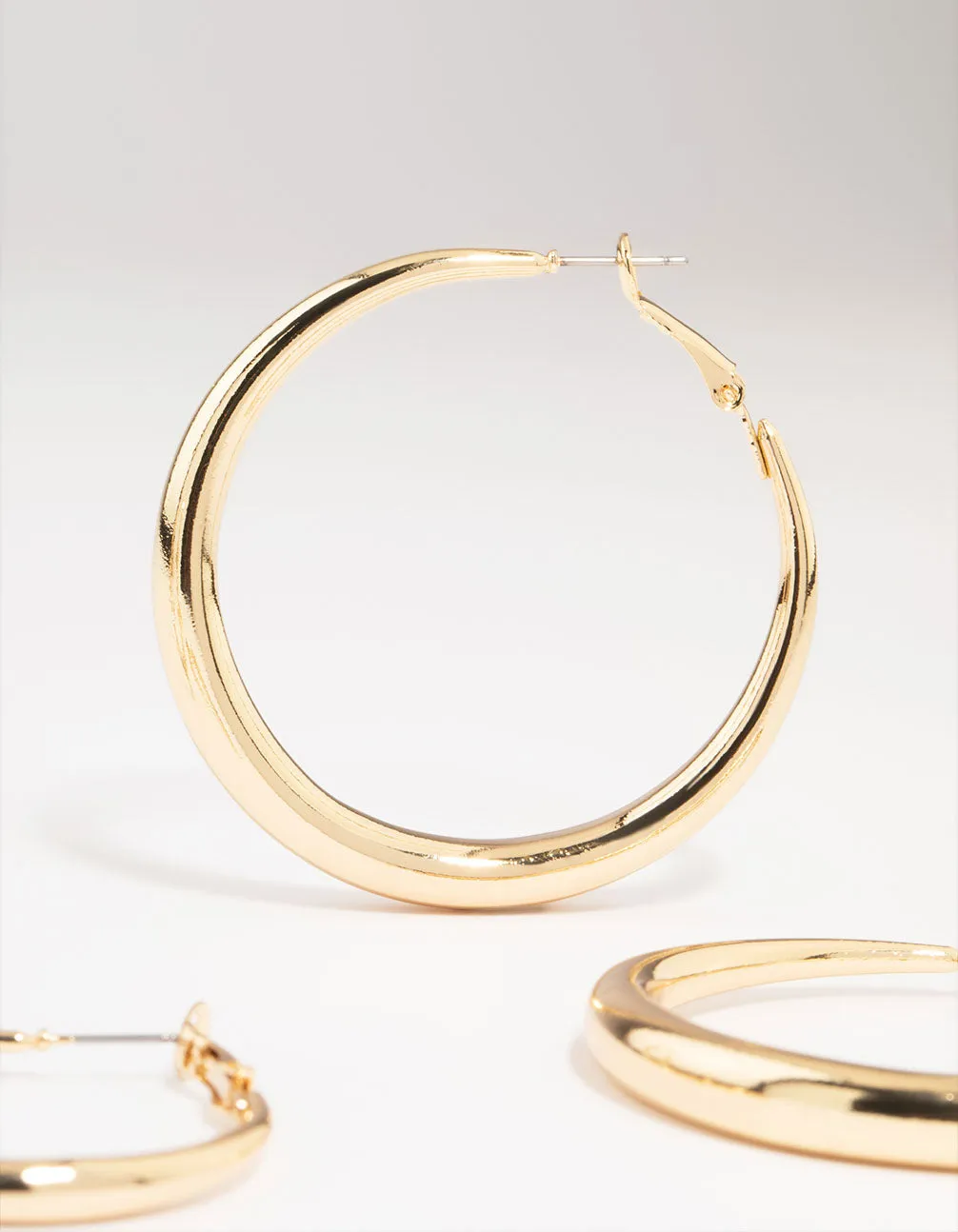 Gold Smooth Huggie Hoop Earrings 3-Pack sold by lovisa product image thumbnail 3