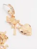 Gold Cherub Heart Cross Huggie Earrings sold by lovisa