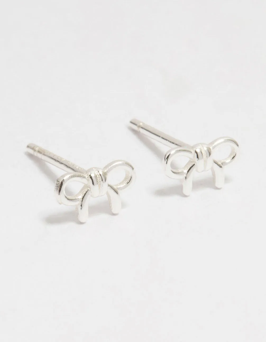 Sterling Silver Mini Clean Bow Stud Earrings sold by lovisa