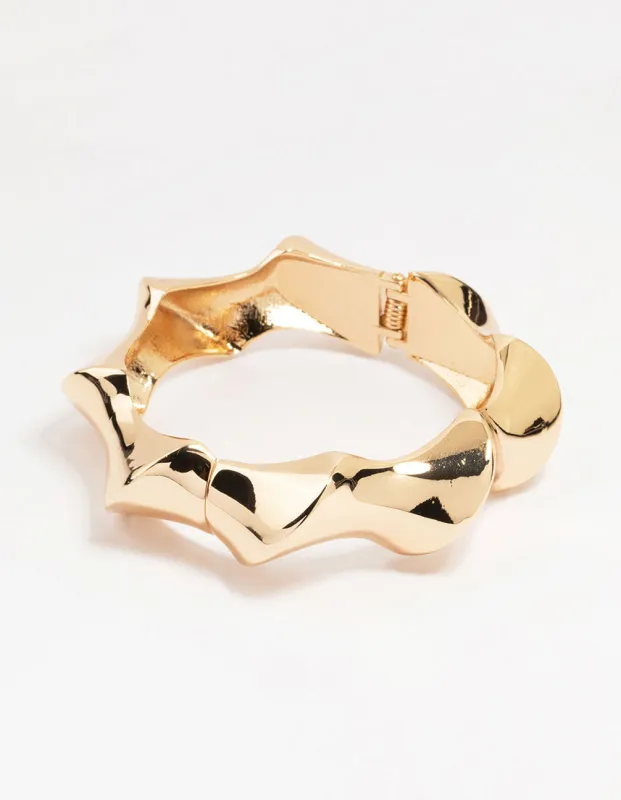 Gold Bamboo Twist Bangle sold by lovisa