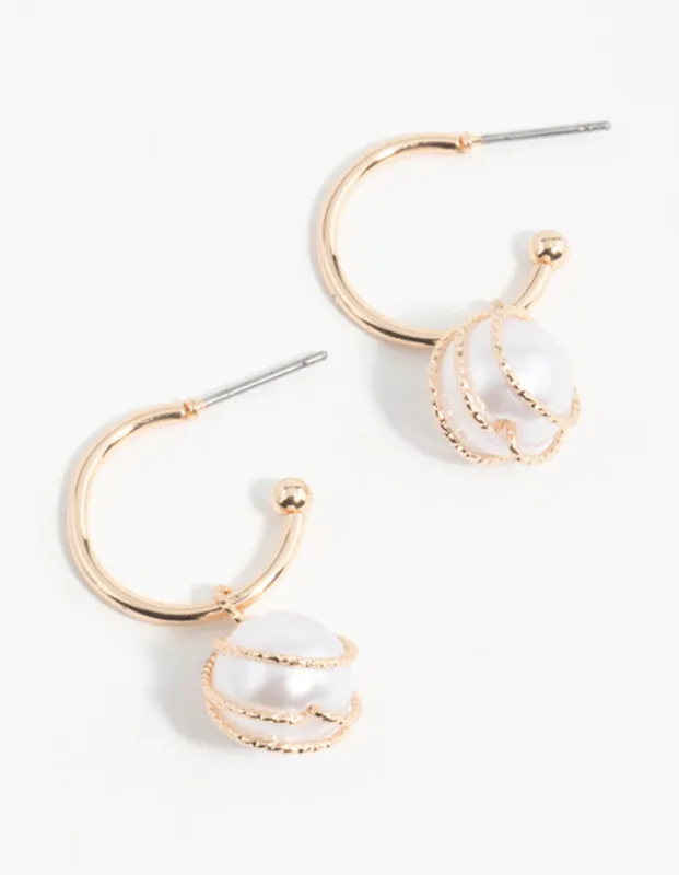Gold Pearl Wire Wrapped Hoop Earrings sold by lovisa