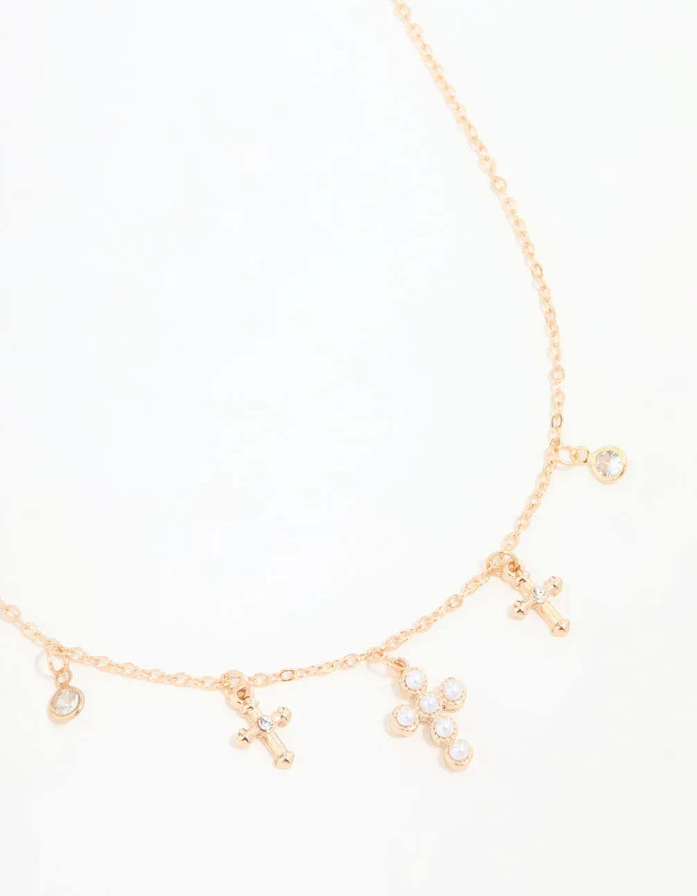 Gold Pearl Diamante Cross Charm Necklace sold by lovisa