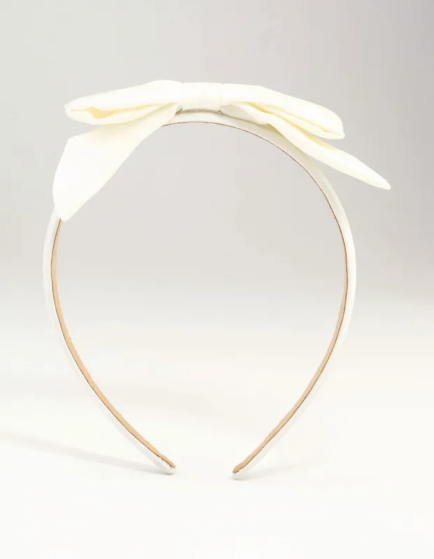 White Fabric Classic Slim Bow Headband sold by lovisa
