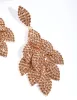Gold Diamante Leaf Earrings sold by lovisa