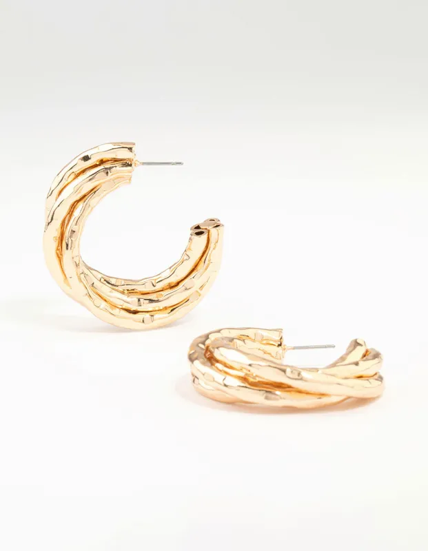 Gold Molten Twisted Hoop Earrings sold by lovisa