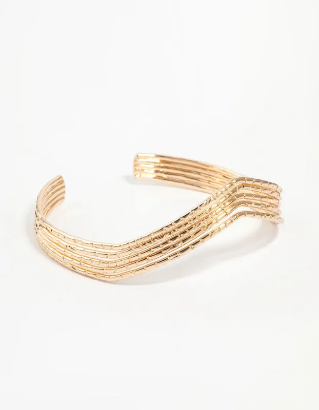 Gold Molten Arrow Arm Cuff sold by lovisa