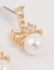Gold Plated Cubic Zirconia & Pearl Bow Drop Earrings sold by lovisa