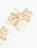 Gold Plated Pearl & Cubic Zirconia Bow Baguette Drop Earrings sold by lovisa
