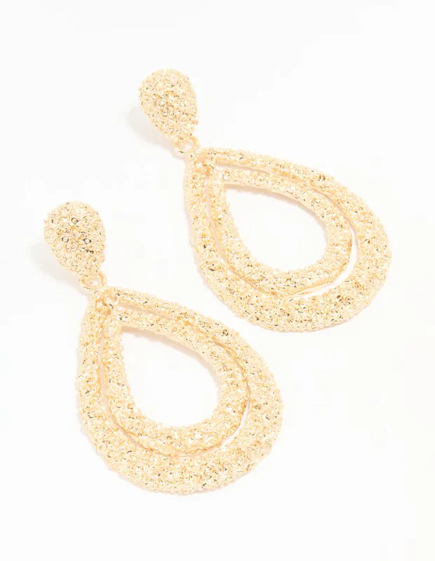 Gold Molten Teardrop Earrings sold by lovisa