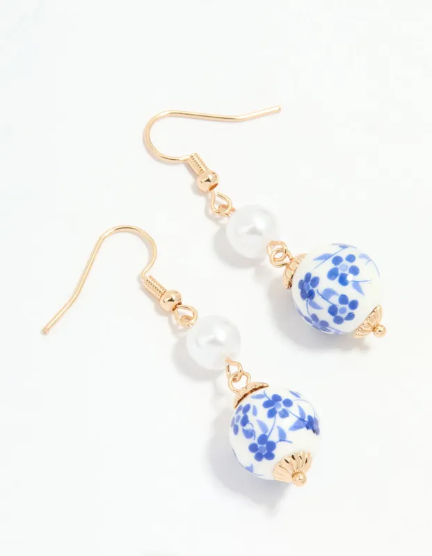 Gold Pearl Painted Drop Earrings sold by lovisa