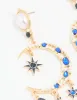Gold Pearl Blue Diamante Celestial Drop Earrings sold by lovisa
