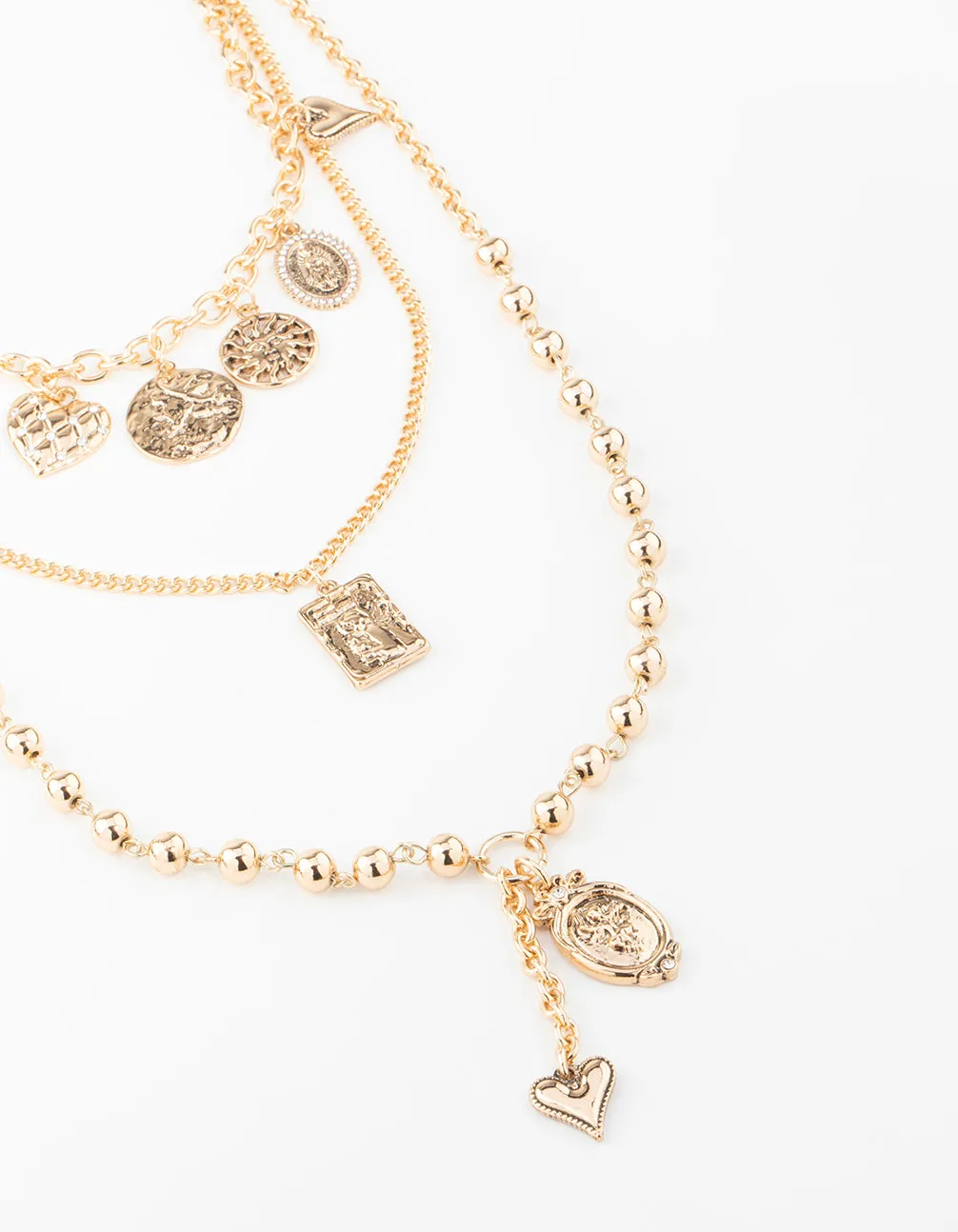 Gold Heart & Textured Charm Layered Necklace sold by lovisa