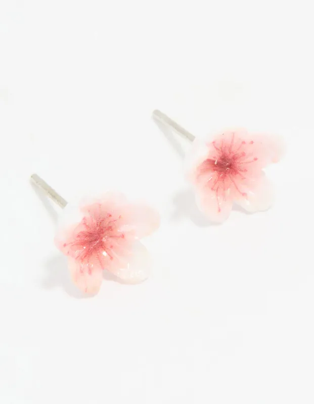 White & Pink Acrylic Frangipani Stud Earrings sold by lovisa