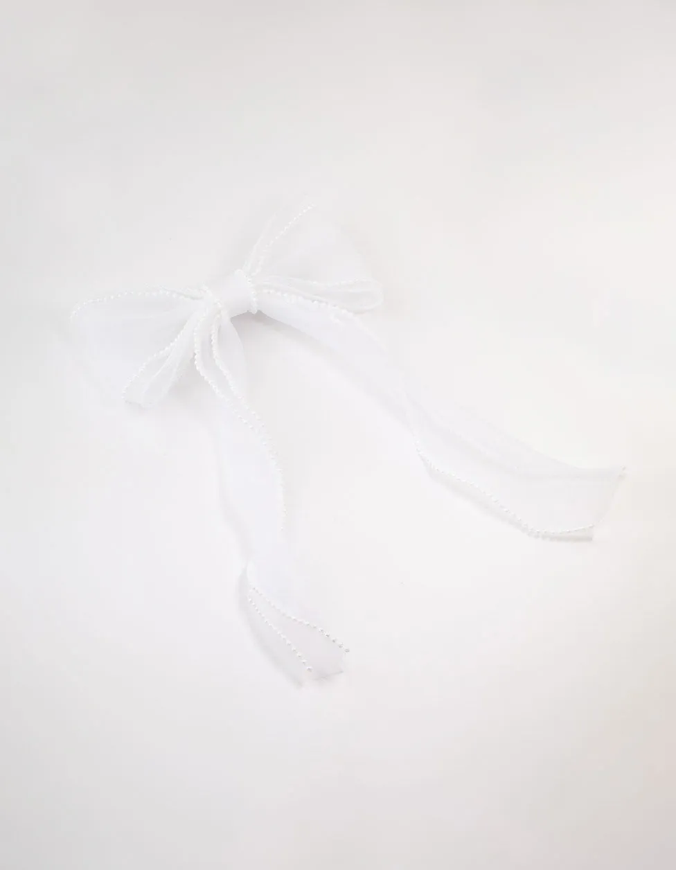 White Organza Fabric & Pearl Bow Hair Clip sold by lovisa
