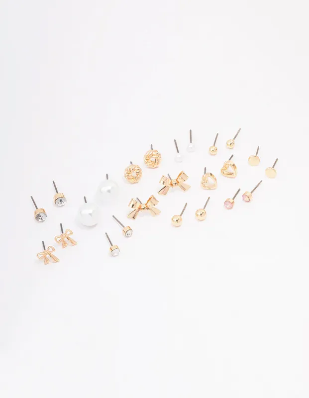 Gold Bow Pearl & Heart Earring 12-Pack sold by lovisa