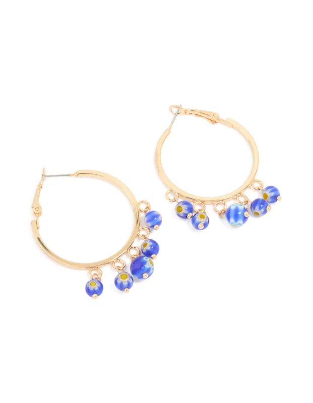 Gold Blue Beaded Ball Hoop Earrings sold by lovisa
