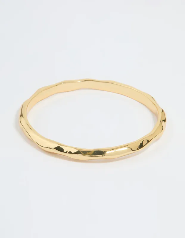 Gold Plated Molten Wavy Bangle sold by lovisa